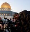 Members of the Palestinian Astronomical Society and Waqf team use a telescope to look for a crescent moon ahead of the Muslim holy month of Ramadan, at Al-Aqsa compound, known to Jews as Temple Mount, in Jerusalem's Old City March 10, 2024. REUTERS/Ammar Awad