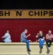 People eat fish and chips at Barry Island, Wales. (Photo by Ben Birchall/PA Images via Getty Images)