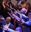 Supporters pray for Republican presidential nominee former President Donald Trump after the National Faith Summit at Worship With Wonders Church, Monday, Oct. 28, 2024, in Powder Springs, Ga. (AP Photo/Brynn Anderson)