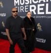 Kanye West and Bianca Censori pose at the red carpet during the 67th Annual Grammy Awards in Los Angeles, California, U.S., February 2, 2025. REUTERS/Daniel Cole