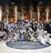 Los jugadores del Real Madrid posan con el trofeo, tras su victoria en el tercer partido de la final de la Liga Endesa que Valencia Basket y Real Madrid han disputado hoy miércoles en el pabellón de la Fuente San Luis