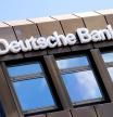 FILED - 24 April 2021, Lower Saxony, Oldenburg: The Deutsche Bank logo and lettering hang on a branch in the city center. Photo: Hauke-Christian Dittrich/dpa
