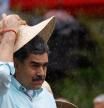 FILE PHOTO: Venezuela's President Nicolas Maduro holds a hat, as he joins his supporters during a march to commemorate the Battle of Santa Ines, on the same day Venezuelan opposition leader Maria Corina Machado was awarded the 2025 Nobel Peace Prize in Norway, in Caracas, Venezuela, December 10, 2025. REUTERS/Leonardo Fernandez Viloria/File Photo