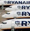 (FILES) In this file photo taken on August 20, 2020 Ryanair aircraft are pictured at Stansted airport, northeast of London. - Irish low-cost airline Ryanair on February 17 lost its attempt in an EU court to block massive public bailouts of rival companies such as Air France and SAS, a statement said. (Photo by Adrian DENNIS / AFP)