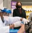 Vice President Kamala Harris watches as physician Linval Matthews, left, administers a Moderna COVID-19 vaccine to Brenda Thompson, right, at a Giant Foods grocery store, Thursday, Feb. 25, 2021, in Washington, as Delegate Eleanor Holmes Norton, D-D.C., background right, looks on. (AP Photo/Andrew Harnik)