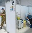 ROME, ITALY - MARCH 25: A man receives a dose of the AstraZeneca COVID-19 vaccine, at the vaccination hub in the military citadel of Cecchignola, on March 25, 2021 in Rome, Italy. At the request of the European Commission, Italian security forces discovered 29 million does of the AstraZeneca vaccine at a Catalent factory. Meanwhile European public trust dwindled with reported side effects of the AstraZeneca vaccine, a prosecutor in Italy is investigating possible manslaughter after a naval office died hours after being inoculated with the AstraZeneca vaccine. (Photo by Antonio Masiello/Getty Images)