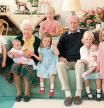 An undated handout picture released by Kensington Palace on April 14, 2021 shows Britain's Queen Elizabeth II and Britain's Prince Philip, Duke of Edinburgh with their great grandchildren. Pictured (L-R) are Britain's Prince George of Cambridge, Britain's Prince Louis of Cambridge being held by Britain's Queen Elizabeth II, Savannah Phillips (standing at rear), Britain's Princess Charlotte of Cambridge, Britain's Prince Philip, Duke of Edinburgh, Isla Phillips holding Lena Tindall, and Mia Tindall. (Photo by THE DUCHESS OF CAMBRIDGE / KENSINGTON PALACE / AFP) / RESTRICTED TO EDITORIAL USE - MANDATORY CREDIT 