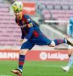 16 May 2021, Spain, Barcelona: Barcelona's Lionel Messi scores his side's first goal during the Spanish Primera Division soccer match between Barcelona and RC Celta de Vigo at the Camp Nou. Photo: David Ramirez/DAX via ZUMA Wire/dpa 16/05/2021 ONLY FOR USE IN SPAIN