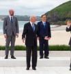 CARBIS BAY, CORNWALL - JUNE 11: (L-R) Canadian Prime Minister Justin Trudeau, President of the European Council Charles Michel, US President Joe Biden, Japanese Prime Minister Yoshihide Suga, British Prime Minister Boris Johnson and Italian Prime Minister Mario Draghi pose for the Leaders official welcome and family photo during the G7 Summit In Carbis Bay, on June 11, 2021 in Carbis Bay, Cornwall. UK Prime Minister, Boris Johnson, hosts leaders from the USA, Japan, Germany, France, Italy and Canada at the G7 Summit. This year the UK has invited India, South Africa, and South Korea to attend the Leaders' Summit as guest countries as well as the EU. (Photo by Jonny Weeks - WPA Pool / Getty Images)