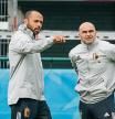 24 June 2021, Belgium, Tubize: Belgium assistant coach Thierry Henry (L) talks with head coach Roberto Martinez during a training session of the Belgian national soccer team ahead of Sunday's UEFA EURO 2020 championship round of 16 soccer match against Portugal. Photo: Bruno Fahy/BELGA/dpa 24/06/2021 ONLY FOR USE IN SPAIN