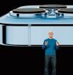 this handout image obtained September 14, 2021 courtesy of Apple Inc. shows Apple CEO Tim Cook showcases the advanced camera system on the new iPhone 13 Pro during a special event at Apple Park. (Photo by Brooks Kraft / Apple Inc. / AFP) / RESTRICTED TO EDITORIAL USE - MANDATORY CREDIT 