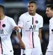 (From L) Paris Saint-Germain's Brazilian forward Neymar, Paris Saint-Germain's French forward Kylian Mbappe and Paris Saint-Germain's Argentinian forward Lionel Messi look on during the UEFA Champions League Group A football match Club Brugge against Paris Saint-Germain (PSG) at Jan Breydel Stadium in Bruges, on September 15, 2021. (Photo by KENZO TRIBOUILLARD / AFP)