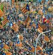 (FILES) In this file photo taken on September 11, 2019 people wave Catalan pro-independence 