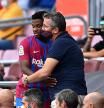 BARCELONA, SPAIN - SEPTEMBER 26: Ansu Fati of FC Barcelona hugs the club doctor during the LaLiga Santander match between FC Barcelona and Levante UD at Camp Nou on September 26, 2021 in Barcelona, Spain. (Photo by David Ramos/Getty Images)