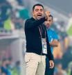 (FILES) In this file photo taken on October 22, 2021 Sadd's coach Xavi speaks to his players during the Amir Cup final football match between Al-Sadd and Al-Rayyan at the Al-Thumama Stadium in the capital Doha. - Ronald Koeman has been sacked as Barcelona coach, on October 27, 2021, after a torrid 14 months, with legendary midfielder Xavi Hernandez the strong favourite to replace him. (Photo by KARIM JAAFAR / AFP)