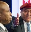 File - Republican candidate for New York City mayor, Curtis Sliwa, right, speaks during a debate with Democratic mayoral candidate Eric Adams in New York, Tuesday, Oct. 26, 2021. Campaign staffers for Sliwa say he has been hit by a yellow cab and taken to a hospital as a precaution. (Eduardo Munoz/Pool Photo via AP, File)