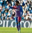VIGO, SPAIN - NOVEMBER 06: Ansu Fati of FC Barcelona holds his hand up to call for medical attention during the La Liga Santander match between RC Celta de Vigo and FC Barcelona at Abanca-BalaÃ­dos on November 06, 2021 in Vigo, Spain. (Photo by Juan Manuel Serrano Arce/Getty Images)