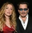 CULVER CITY, CA - JANUARY 09: Actors Amber Heard (L) and Johnny Depp attend The Art of Elysium 2016 HEAVEN Gala presented by Vivienne Westwood & Andreas Kronthaler at 3LABS on January 9, 2016 in Culver City, California. (Photo by Michael Kovac/Getty Images for Art of Elysium)
