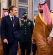 A handout picture provided by the Saudi Royal Palace shows Saudi Crown Prince Mohammed bin Salman (R) receiving French President Emmanuel Macron (L) in Saudi Arabia's Red Sea coastal city of Jeddah on December 4, 2021. (Photo by Bandar AL-JALOUD / Saudi Royal Palace / AFP) / RESTRICTED TO EDITORIAL USE - MANDATORY CREDIT 