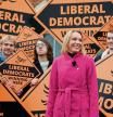 Newly elected Liberal Democrat lawmaker Helen Morgan, celebrates in Oswestry, Shropshire, England, Friday Dec. 17, 2021, following her victory in the North Shropshire by-election. U.K. Prime Minister Boris Johnsonâ#{emoji}128;#{emoji}153;s Conservative Party has suffered a stunning defeat in a parliamentary by-election that was a referendum on his government amid weeks of scandal and soaring COVID-19 infections. (Jacob King/PA via AP)