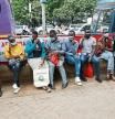 Civilians queue to receive the coronavirus disease (COVID-19) vaccine at a makeshift tent as the government orders for proof of vaccination to access public places and transport, in downtown Nairobi, Kenya December 23, 2021. REUTERS/Monicah Mwangi