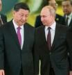 FILE - Chinese President Xi Jinping and Russian President Vladimir Putin enter a hall for talks in the Kremlin in Moscow, Russia, June 5, 2019. The U.S., Britain and a handful of others arenâ#{emoji}128;#{emoji}153;t sending dignitaries to the Beijing Games as part of a diplomatic boycott, but the Chinese capital is still attracting an array of world leaders for Fridayâ#{emoji}128;#{emoji}153;s opening ceremony. Russiaâ#{emoji}128;#{emoji}153;s athletes will be competing under a neutral flag, but the presence of Putin, an enthusiastic skier and hockey player, will reinforce that they are the Russian national team in all but name and soothe wounded national pride. (AP Photo/Alexander Zemlianichenko, Pool, File)