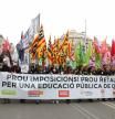 Pancarta principal de la manifestación de docentes en Barcelona en el cuarto día de huelga