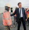 Current French President and centrist presidential candidate for reelection Emmanuel Macron meets workers as he visits a building site for Logâ#{emoji}128;#{emoji}153;s company in Denain, northern France, Monday, April 11, 2022 . French President Emmanuel Macron declared Monday that he wants to â#{emoji}128;#{emoji}156;convince