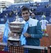 Carlos Alcaraz, con su trofeo Godó, este domingo en Barcelona