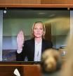 Model Kate Moss, a former girlfriend of actor Johnny Depp, testifies via video link at the Fairfax County Circuit Courthouse in Fairfax, Va., Wednesday, May 25, 2022. Depp sued his ex-wife Amber Heard for libel in Fairfax County Circuit Court after she wrote an op-ed piece in The Washington Post in 2018 referring to herself as a 