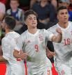 Spain's midfielder Pablo Gavi (C) celebrates scoring the 1-1 goal with Spain's midfielder Rodrigo Hernandez (R) and Spain's defender Dani Carvajal during the UEFA Nations League - League A Group 2 football match between Czech Republic and Spain at the Sinobo Stadium in Prague, on June 5, 2022. (Photo by Michal Cizek / AFP)