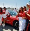 Julie Brangstrup, Sharlely Becker, Jackie Cruz, Rachel Zeilic, Gala Gonzalez, Jodie Kidd with Porsche Taycan at Cash&Rocket car display