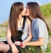 Young couple in love kissing outdoors