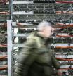FILE PHOTO: A view shows equipment at the data centre of BitRiver company providing services for cryptocurrency mining in the city of Bratsk in Irkutsk Region, Russia March 2, 2021. REUTERS/Maxim Shemetov/File Photo