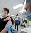FILE PHOTO: A man is vaccinated at a monkeypox vaccination clinic run by CIUSSS public health authorities in Montreal, Quebec, Canada, June 6, 2022. REUTERS/Christinne Muschi/File Photo