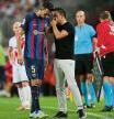 BARCELONA, SPAIN - AUGUST 13: Sergio Busquets of FC Barcelona interacts with Xavi, Head Coach of FC Barcelona during the LaLiga Santander match between FC Barcelona and Rayo Vallecano at Camp Nou on August 13, 2022 in Barcelona, Spain. (Photo by Alex Caparros/Getty Images)