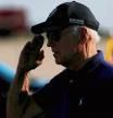 U.S. President Joe Biden salutes as he arrives aboard Air Force One at the Delaware Air National Guard Base in New Castle, Delaware, U.S., August 26, 2022. REUTERS/Jonathan Ernst