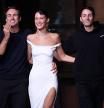 French designers Sebastien Meyer (L) and Arnaud Vaillant (R) and US model Bella Hadid greet the audience at the end of the Coperni Spring-Summer 2023 fashion show as part of the Paris Womenswear Fashion Week, in Paris, on September 30, 2022. (Photo by JULIEN DE ROSA / AFP)