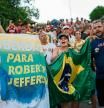 Supporters of former lawmaker Roberto Jefferson protest against his arrest next to his house in Levy Gasparian, Rio de Janeiro state, Brazil, Sunday, Oct. 23, 2022. Jefferson, an ally of Brazilian President Jair Bolsonaro, fired gunshots and a grenade at federal policemen who tried to arrest him in for insulting supreme court ministers, according to Brazil’s federal police. (AP Photo/Bruna Prado)