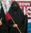 Iranian women flash a victory sign during annual demonstration in front of the former U.S. Embassy in Tehran, Iran, Friday, Nov. 4, 2022. Iran on Friday marked the 1979 takeover of the U.S. Embassy in Tehran as its theocracy faces nationwide protests after the death of a 22-year-old woman earlier arrested by the country's morality police. (AP Photo/Vahid Salemi)