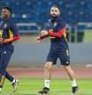 Spain's forward Ansu Fati (L), Spain's defender Dani Carvajal (C) and Spain's defender Sergio Busquets (R) take part in a training session at Al-Hussein Youth City Stadium, in Amman on November 16, 2022, a day before Spain faces Jordan in a friendly match in the Jordanian capital. (Photo by Khalil MAZRAAWI / AFP)
