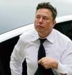 FILE - Elon Musk arrives at the justice center in Wilmington, Del., Tuesday, July 13, 2021. According to a filing posted late Wednesday, Dec. 14, 2022, by the U.S. Securities and Exchange Commission, Musk sold another $3.58 billion worth of Tesla stock during the week, but it wasn’t clear where the proceeds were being spent. Musk has sold nearly $23 billion worth of Tesla stock since April, with much of the money likely going to help fund his $44 billion acquisition of Twitter. (AP Photo/Matt Rourke, File)