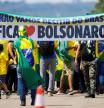 Supporters of Brazil's President Jair Bolsonaro take part in a protest against Brazilian President-elect Luiz Inacio Lula da Silva at the Alvorada Palace, in Brasilia, Brazil, December 12, 2022. REUTERS/Adriano Machado