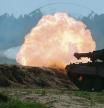 FILE PHOTO: A Polish Leopard 2PL tank fires during Defender Europe 2022 military exercise of NATO troops including French, American, and Polish troops, amid the Russian invasion of Ukraine, at the military range in Bemowo Piskie, near Orzysz, Poland May 24, 2022. REUTERS/Kacper Pempel/File Photo