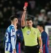 BARCELONA, SPAIN - JANUARY 25: Referee Jesus Gil Manzano shows a red card to Brais Mendez of Real Sociedad, after a Video Assistant Referee review upgraded the foul from a yellow to a red card during the Copa Del Rey Quarter Final match between FC Barcelona and Real Sociedad at Spotify Camp Nou on January 25, 2023 in Barcelona, Spain. (Photo by Alex Caparros/Getty Images)