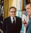 President Richard Nixon congragulates Secy of State Henry Kissinger at the White House after it was announced that Kissinger and North Vietnam's Le Duc Tho had won the 1973 Nobel Peace Prize jointly for negotiating the end of the Vietnam War. (Photo by UPI Color/Bettmann Archive/Getty Images)