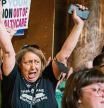 Opponents of LB626, which would have banned abortions in Nebraska after about six weeks, celebrate in the Rotunda after the bill fails to get the votes necessary to invoke cloture, Thursday, April 27, 2023, at the Nebraska State Capital in Lincoln, Neb. (Larry Robinson/Lincoln Journal Star via AP)