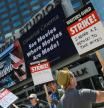 LOS ANGELES, CA - MAY 3: Members of the Writers Guild of America (WGA) and its supporters picket outside of Universal Studios on May 3, 2023 in Universal City, California. Writers Guild of America members have gone on strike in a contract dispute with studios and streaming services over lowering wages, residuals and the future of AI in entertainment. Rodin Eckenroth/Getty Images/AFP (Photo by Rodin Eckenroth / GETTY IMAGES NORTH AMERICA / Getty Images via AFP)