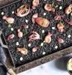 Arroz negro 'a la llauna' con cananas