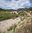 GRAFCAT3042 Sant Llorenç de la Muga (GIRONA) 04/08/2023. El río Muga a su paso por el puente de Riambau (Girona), presentaba hoy viernes este aspecto debido a la sequía y la falta de lluvias en Cataluña desde finales del 2021, lo cual ha obligado a la Agencia Catalana del Agua (ACA), a declarar el estado de emergencia en 22 municipios del Alt Empordá. EFE/David Borrat.